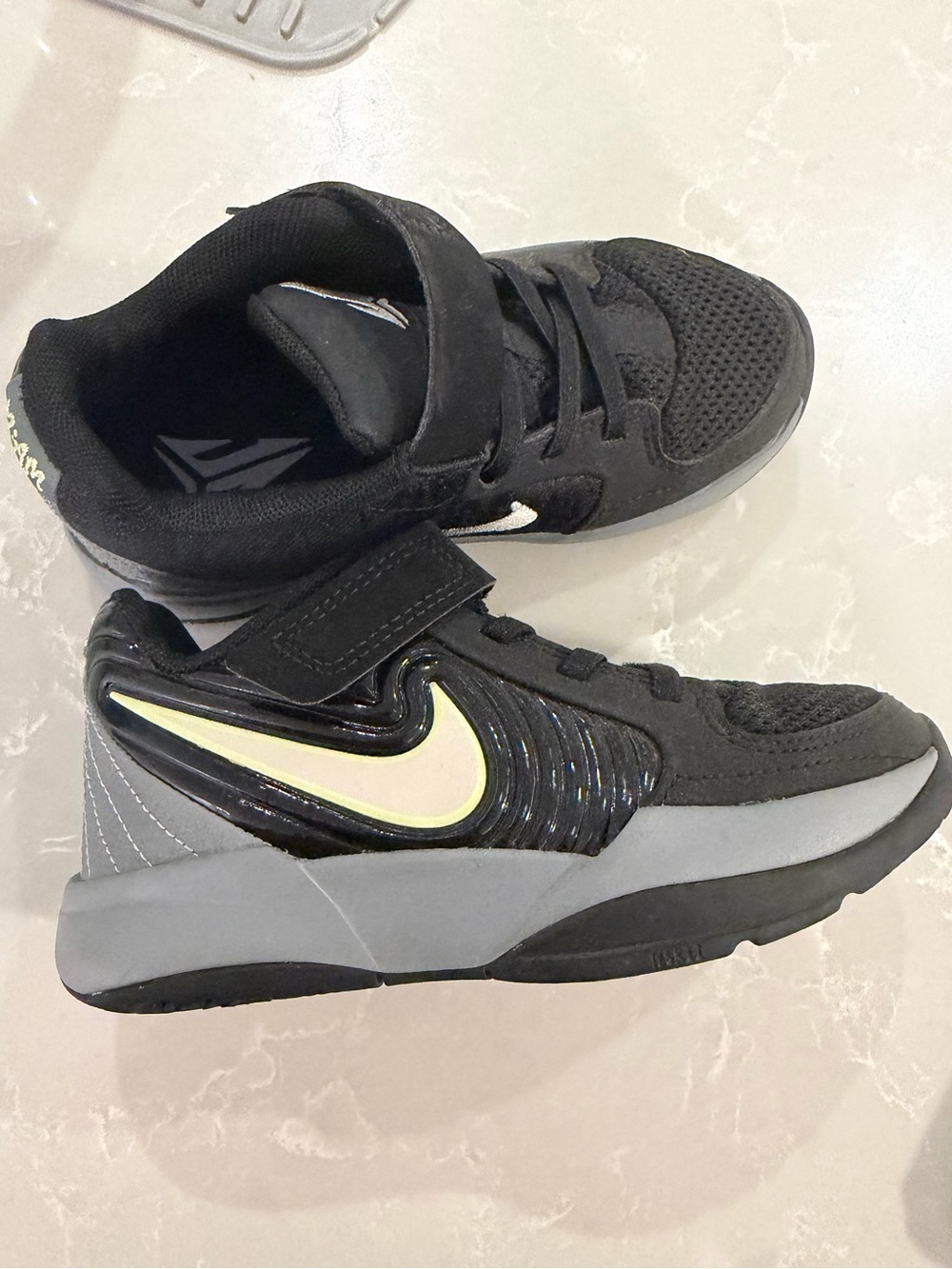 Nike Kids Black and Gray Sneakers with Pale Yellow Swoosh